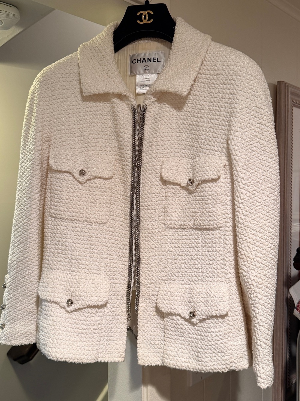 CHANEL Cream Bouclé Zip Jacket with Four Pockets